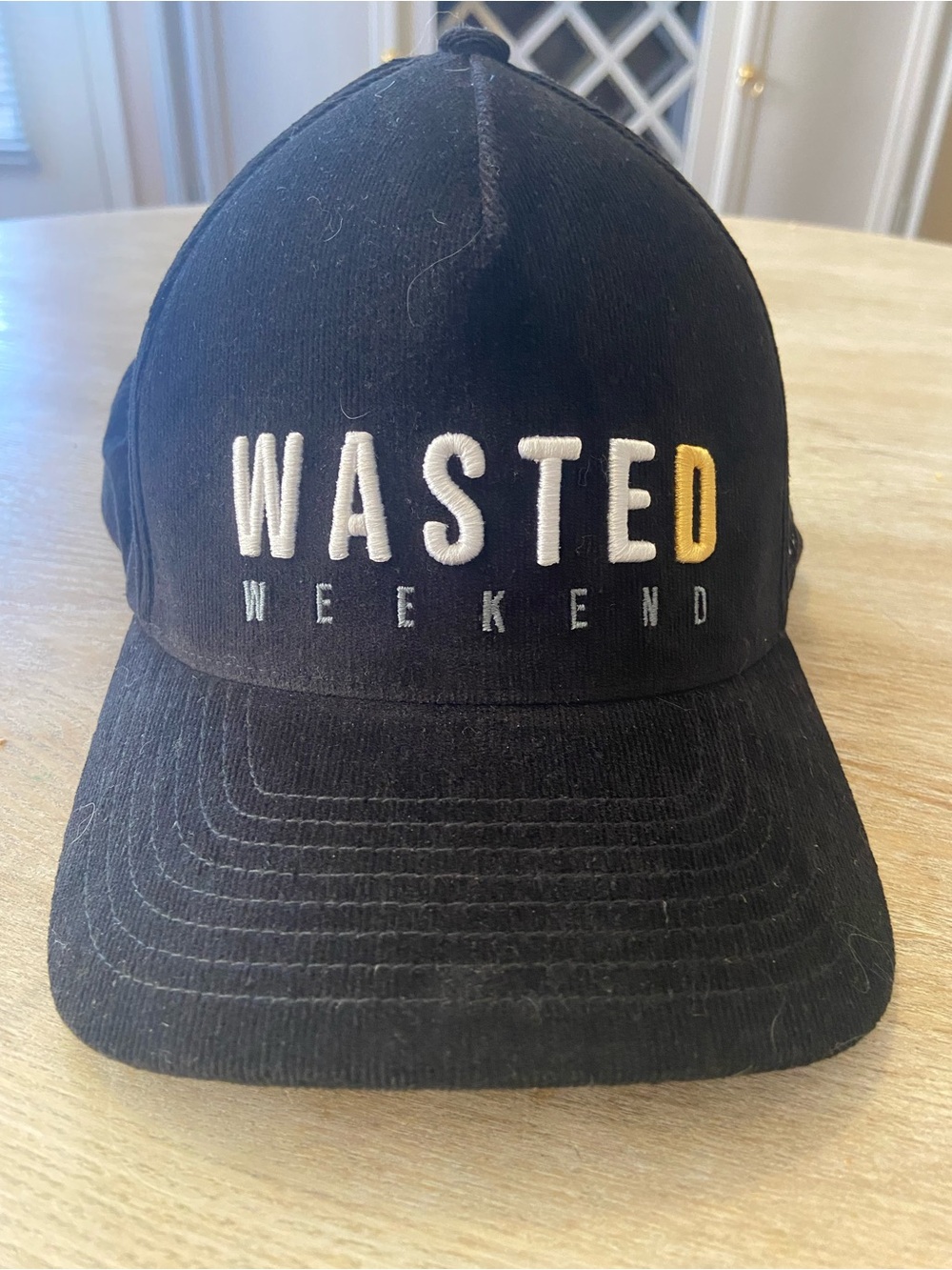 Travis Mathew Black Baseball Cap with White Logo Embroidery